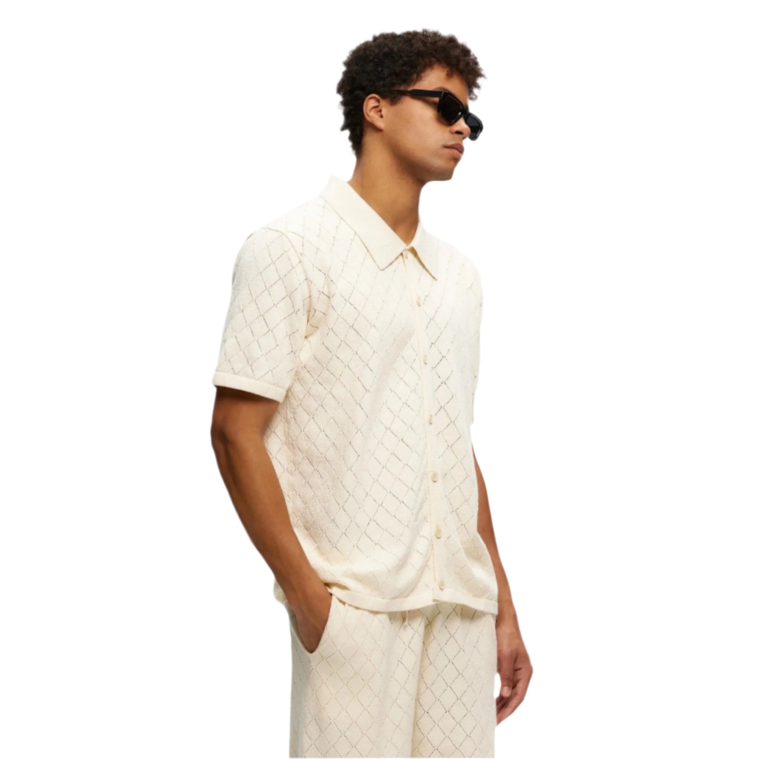 Polo tricoté crème