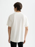 T-shirt à logo sur la poitrine - Blanc cassé
