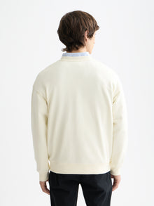 Sweat-shirt blanc avec logo sur la poitrine