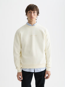 Sweat-shirt blanc avec logo sur la poitrine